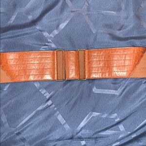Brown stretchy belt. Size M/L